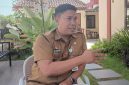 Kepala Dinas Ketenagakerjaan Kabupaten Sumenep, Heru Susanto, saat ditemui di halaman kantornya (Za - garudajatim.com) 