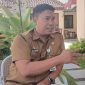 Kepala Dinas Ketenagakerjaan Kabupaten Sumenep, Heru Susanto, saat ditemui di halaman kantornya (Za - garudajatim.com) 