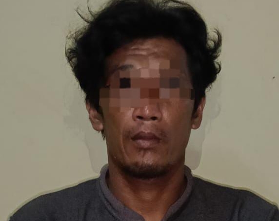 Pria Berinisial EK (41) warga pulau Masalembu, diringkus Polres Sumenep (Istimewa - garudajatim.com) 