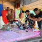 Disdukcapil Sumenep saat melakukan program Karemator (Za - garudajatim.com) 