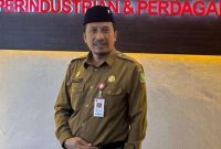 Kepala Dinas Koperasi UKM dan Perindustrian Perdagangan (Diskop UKM dan Perindag) Sumenep, Moh. Ramli, saat ditemui di kantornya (Istimewa - garudajatim.com)