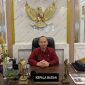 Kepala Bappeda Sumenep, Dr. Ir. Arif Firmanto, S.TP., M.Si., IPU., saat ditemukan di ruang kerjaanya (Istimewa - garudajatim.com) 