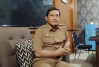 Kepala Dinsos P3A Sumenep, Mustangin, saat diwawancarai di kantornya (Za - Di) 