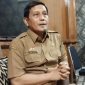 Kepala Dinsos P3A Sumenep, Mustangin, saat mengungkapkan tentang kuota program pendidikan gratis (Za - garudajatim.com) 