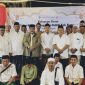 Kepala Bakesbangpol Sumenep, Achmad Dzulkarnain, saat foto bersama dengan seluruh pejabat dalam rangka memperingati Maulid Nabi Muhammad serta pembubaran anggota Baskibra ( Za - garudajatim.com) 