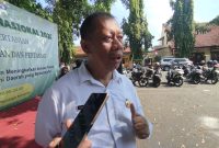 Kepala DKPP Sumenep, Chainur Rasyid, saat diwawancarai pada gelaran Hari Tani Nasional (Za - garudajatim.com)