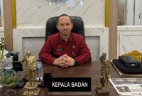 Kepala Badan Perencanaan Pembangunan Daerah (Bappeda) Sumenep, Arif Firmanto, saat berada di kantornya (Za - garudajatim.com) 