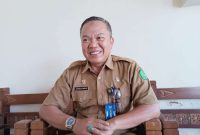 Kepala Bidang Pencegahan dan Pengendalian Penyakit (P2P) Dinas Kesehatan P2KB Sumenep, Achmad Syamsuri, saat menjelaskan tentang KLB Campak di ruang kerjnaya (Istimewa - garudajatim.com)