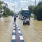 Jalan raya Selamat datang Sumenep terendam banjir (Za - garudajatim.com) 