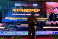 Kepala DPMSTP Sumenep, Rahman Riadi, ketika sambutan di acara inti Sumenep Investment Summit (Za - garudajatim.com)