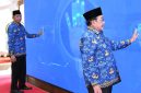 Kepala Disdukcapil Sumenep, R. Ach. Syahwan Effendi, bersama Wabub Sumenep, Imam Hasyim, saat meluncurkan aplikasi SIKERIS (Za - Garuda Jatim)