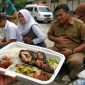 Foto ilustrasi Guru diare usai konsumsi program MBG di SPPG Pakamban Laok 2 (Ris - garudajatim.com)