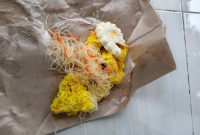 Foto MBG yang disalurkan oleh SPPG Lenteng Timur 3 diduga makanan tidak layak konsumsi kepada siswa (Za - garudajatim.com)