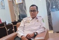 Kepala Badan Kepegawaian dan Pengembangan Sumber Daya Manusia (BKPSDM) Sumenep, Benny Irawan, saat diwawancarai di ruang kerjanya (Istimewa - garudajatim.com)
