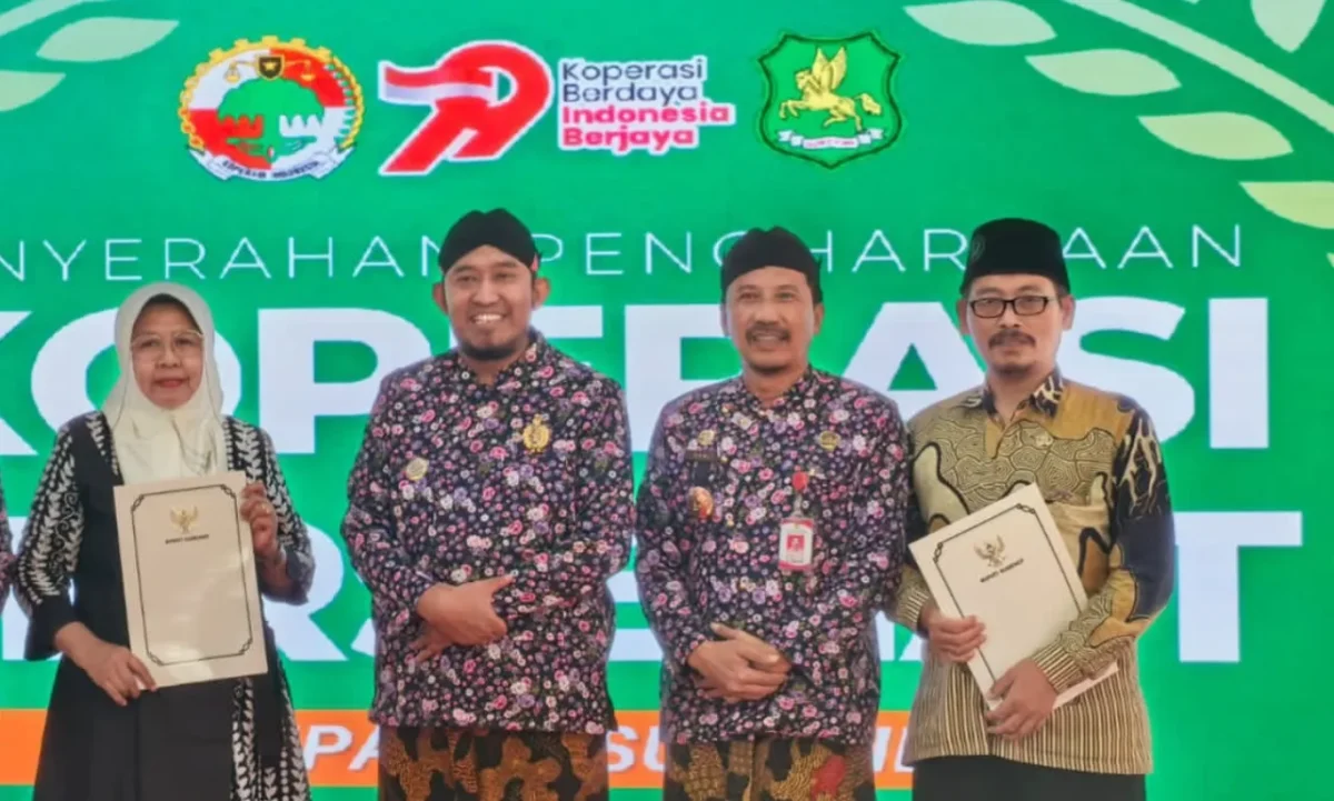 Kepala Diskop UKM Perindag Kabupaten Sumenep, Moh. Ramli, (dua kiri) saat memperingati Harkopnas ke-79 (Istimewa- garudajatim.com)