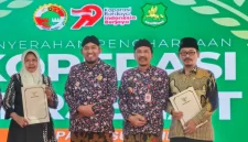 Kepala Diskop UKM Perindag Kabupaten Sumenep, Moh. Ramli, (dua kiri) saat memperingati Harkopnas ke-79 (Istimewa- garudajatim.com)