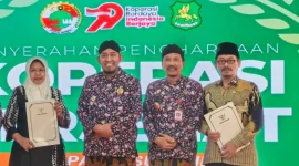 Kepala Diskop UKM Perindag Kabupaten Sumenep, Moh. Ramli, (dua kiri) saat memperingati Harkopnas ke-79 (Istimewa- garudajatim.com)