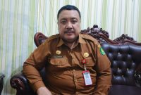Pelaksana Tugas (Plt) Kepala Disperkimhub Sumenep, Dzulkarnain, saat ditemui di kantornya (Istimewa - garudajatim.com)