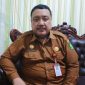 Pelaksana Tugas (Plt) Kepala Disperkimhub Sumenep, Dzulkarnain, saat ditemui di kantornya (Istimewa - garudajatim.com)