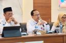Kepala Bappeda Kabupaten Sumenep, Arif Firmanto (tengah berkacamata) saat sambutan (Za - garudajatim.com)