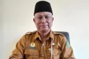 Kepala Dinas Pendidikan Kabupaten Sumenep, Moh. Iksan, saat diwawancarai di ruangannya (Istimewa - garudajatim.com)