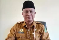 Kepala Dinas Pendidikan Kabupaten Sumenep, Moh. Iksan, saat diwawancarai di ruangannya (Istimewa - garudajatim.com)