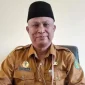 Kepala Dinas Pendidikan Kabupaten Sumenep, Moh. Iksan, saat diwawancarai di ruangannya (Istimewa - garudajatim.com)