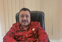 Kepala DPMD Kabupaten Sumenep, Achmad Dzulkarnain, saat menyampaikan tentang penerapan sistem electronic voting (e-Voting) pada Pemilihan Kepala Desa (Pilkades) Serentak 2027 (Za - garudajatim.com)