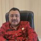 Kepala DPMD Kabupaten Sumenep, Achmad Dzulkarnain, saat menyampaikan tentang penerapan sistem electronic voting (e-Voting) pada Pemilihan Kepala Desa (Pilkades) Serentak 2027 (Za - garudajatim.com)