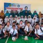 Dinskes P2KB Sumenep foto bersama SMP Guluk - Guluk saat melaksanakan kegiatan GEBASMIA (Za - garudajatim.com)
