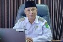 Kepala Disdik Sumenep, Moh. Iksan, saat diwawancarai di ruangannya (Istimewa - garudajatim.com)