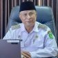 Kepala Disdik Sumenep, Moh. Iksan, saat diwawancarai di ruangannya (Istimewa - garudajatim.com)